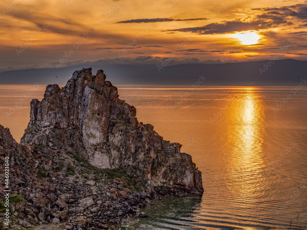 Sunset on Baikal lake at Olkhon island. Lake Baikal is the most largest freshwater lake in the planet.