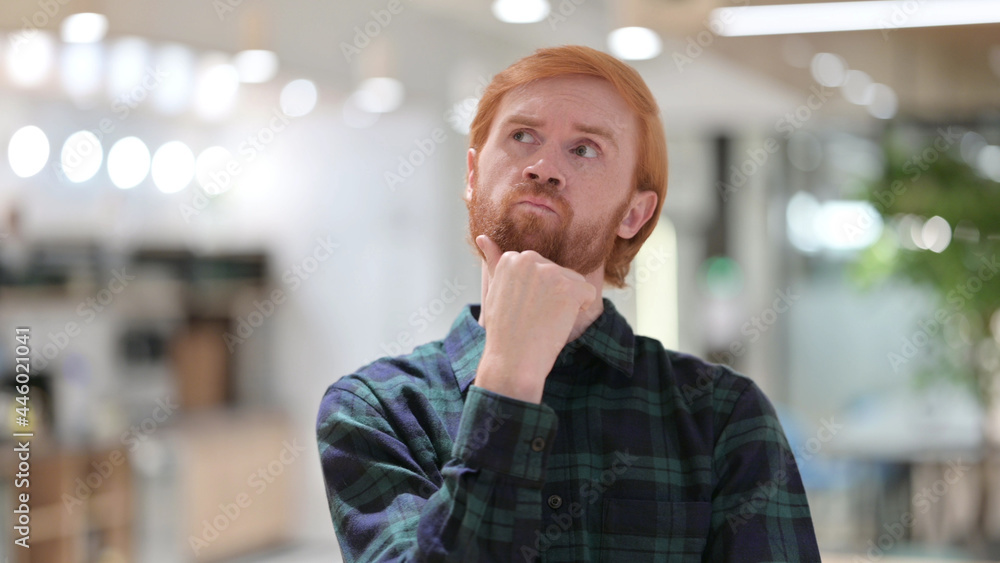 Naklejka premium Portrait of Redhead Man Thinking New Plan