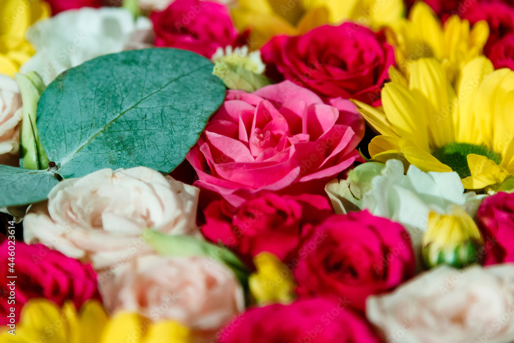 Fototapeta premium beautiful bouquet of roses and wildflowers