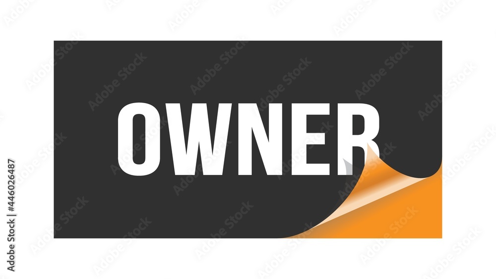 OWNER text written on black orange sticker. OWNER text written on black orange sticker.