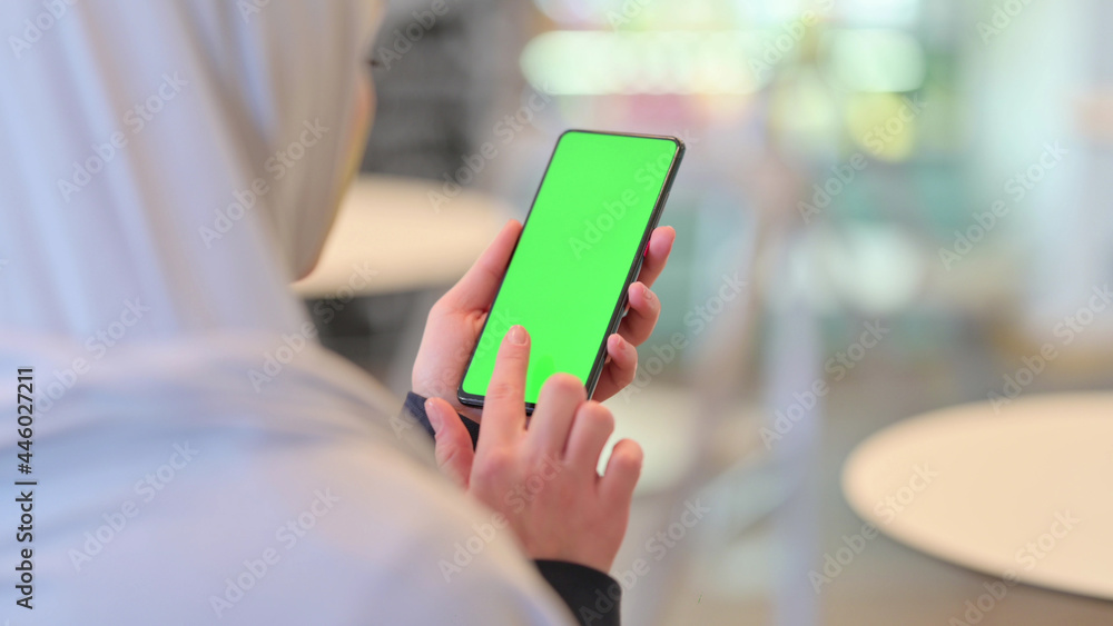 Arab Woman Using Smartphone with Green Chroma Screen Arab Woman Using Smartphone with Green Chroma Screen