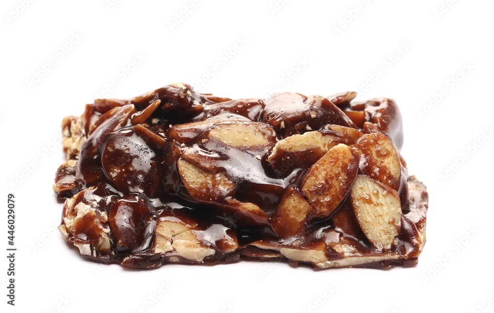 Almond and chocolate brittle piece, protein snack isolated on white background Almond and chocolate brittle piece, protein snack isolated on white background