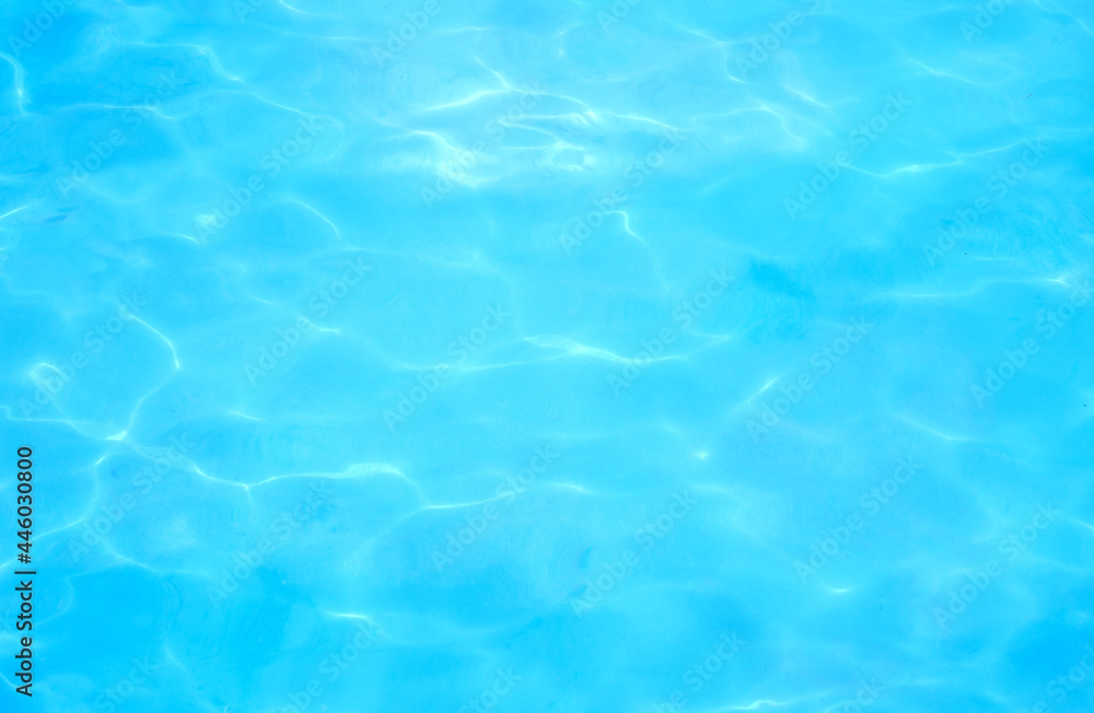 Texture of blue water in the pool