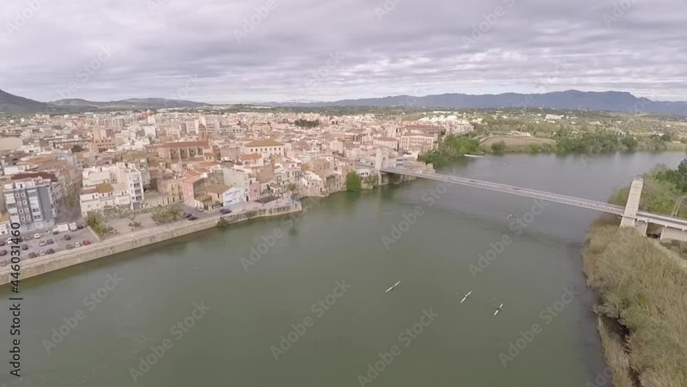 aerial views of the ebro river with boats and villages aerial views of the ebro river with boats and villages