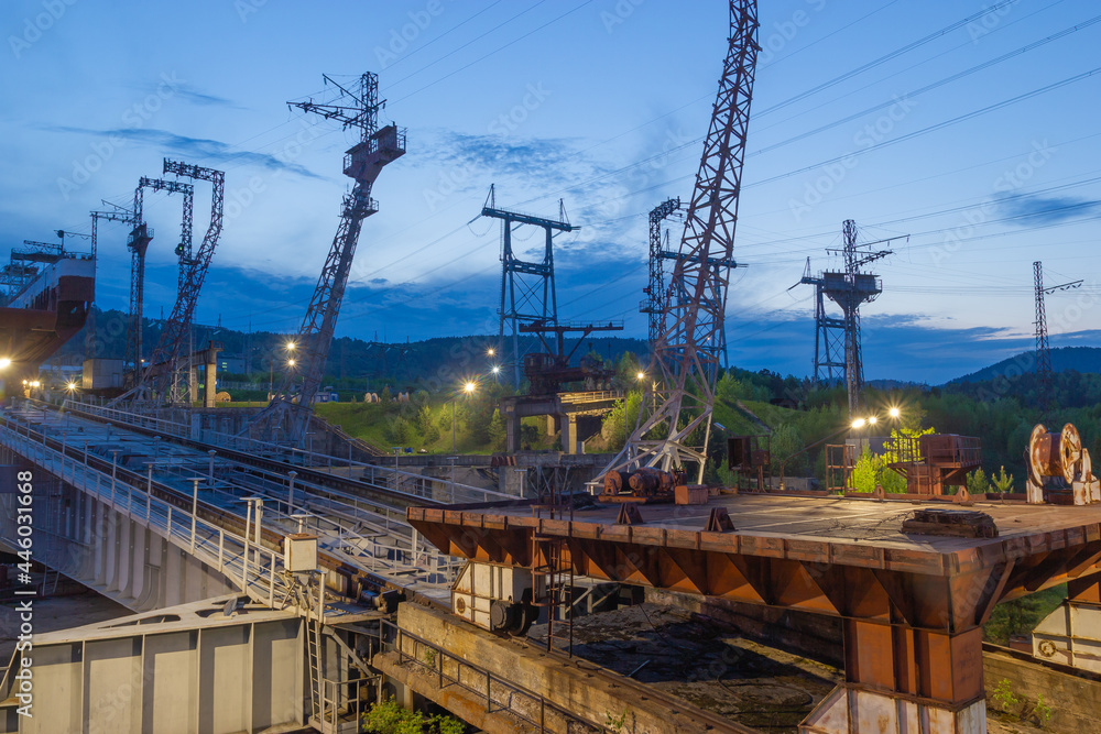 View of the platform of the ship lift. Industrial night background. View of the platform of the ship lift. Industrial night background.