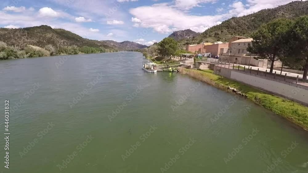 aerial views of the ebro river with boats and villages aerial views of the ebro river with boats and villages