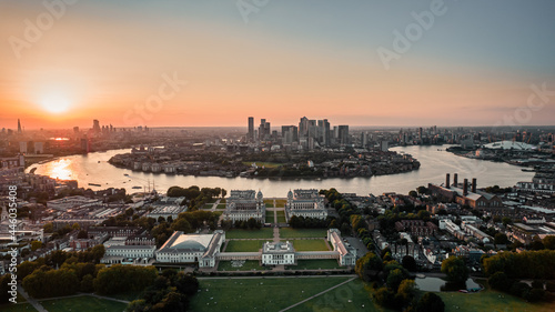 Sunset Aerial bird's eye view photo taken by drone of Greenwich park with views to Canary Wharf, Isle of Dogs, London, United Kingdom photo
