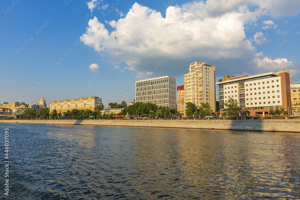 Moskva River and urban architecture of the capital downtown on a summer day. Moscow, Russia