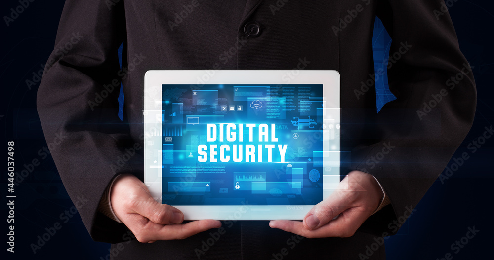 Person holding tablet, security concept Person holding tablet, security concept