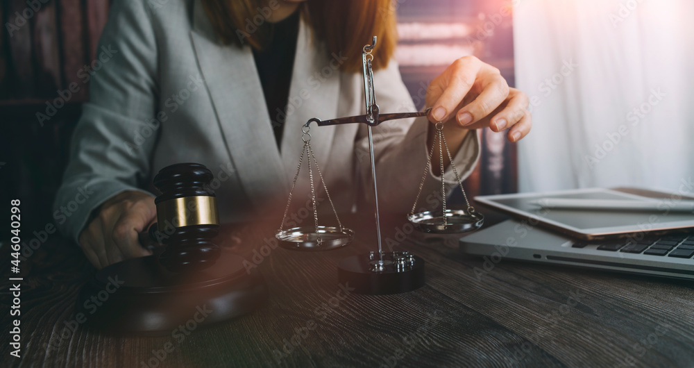 justice and law concept.Male judge in a courtroom on wooden table and Counselor or Male lawyer working in office. Legal law, advice and justice concept. justice and law concept.Male judge in a courtroom on wooden table and Counselor or Male lawyer working in office. Legal law, advice and justice concept.