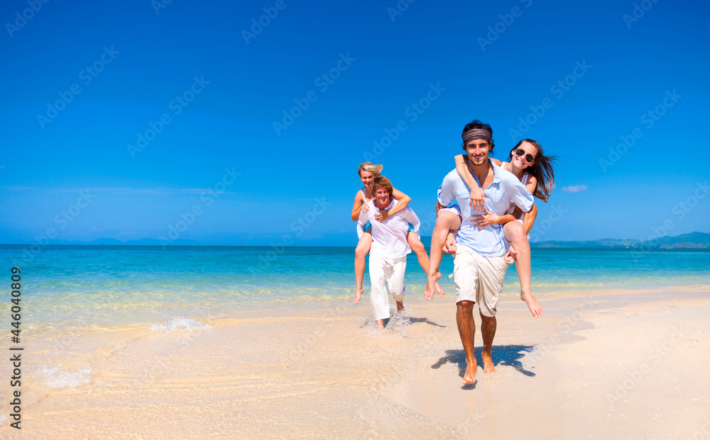 Caucasian couples at the beach Caucasian couples at the beach