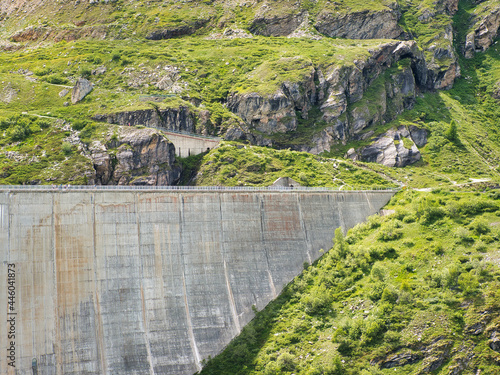 Fotografie, Tablou Part of the embankment dam of the reservoir Lac de Moiry in the Swiss Alpine val