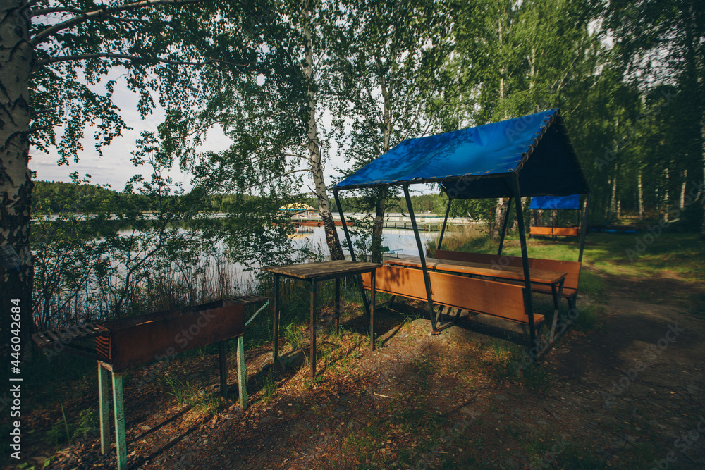 View of the gazebo by the lake. recreation area by the water