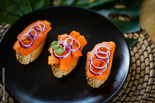 Принти на полотні vegan salmon substitute made from carrots on a whole grain baguette slice as hea