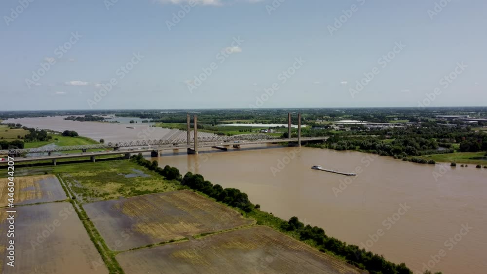 Martinus Nijhoff bridge over the river Waal in the Netherlands, floodplains flooded land, high water level, Aerial Martinus Nijhoff bridge over the river Waal in the Netherlands, floodplains flooded land, high water level, Aerial