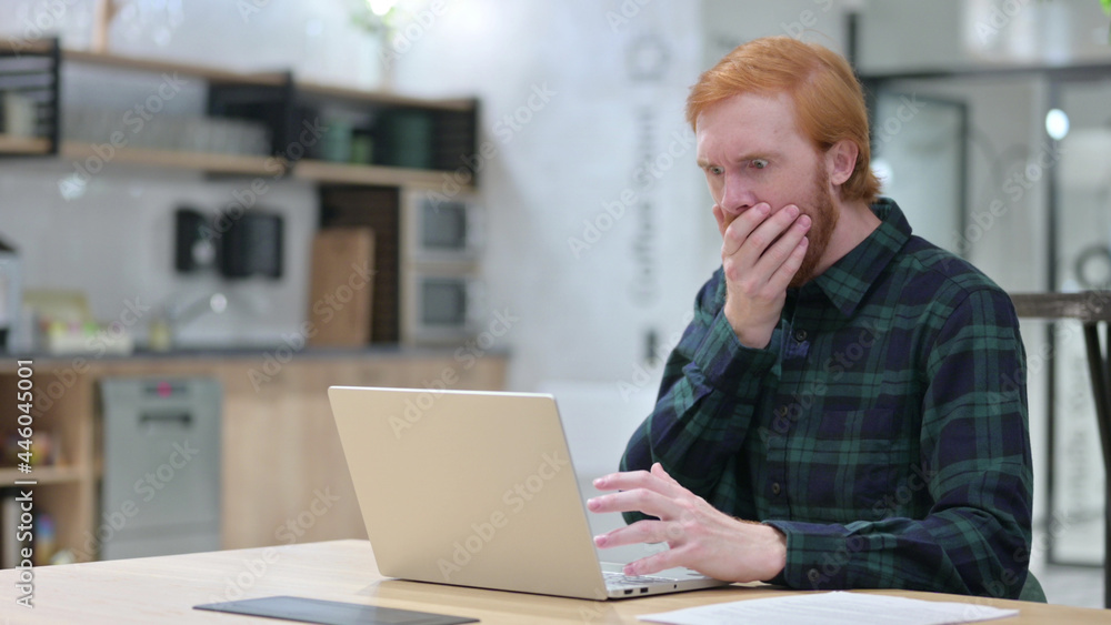 Redhead Man with Laptop feeling Shocked, Redhead Man with Laptop feeling Shocked,