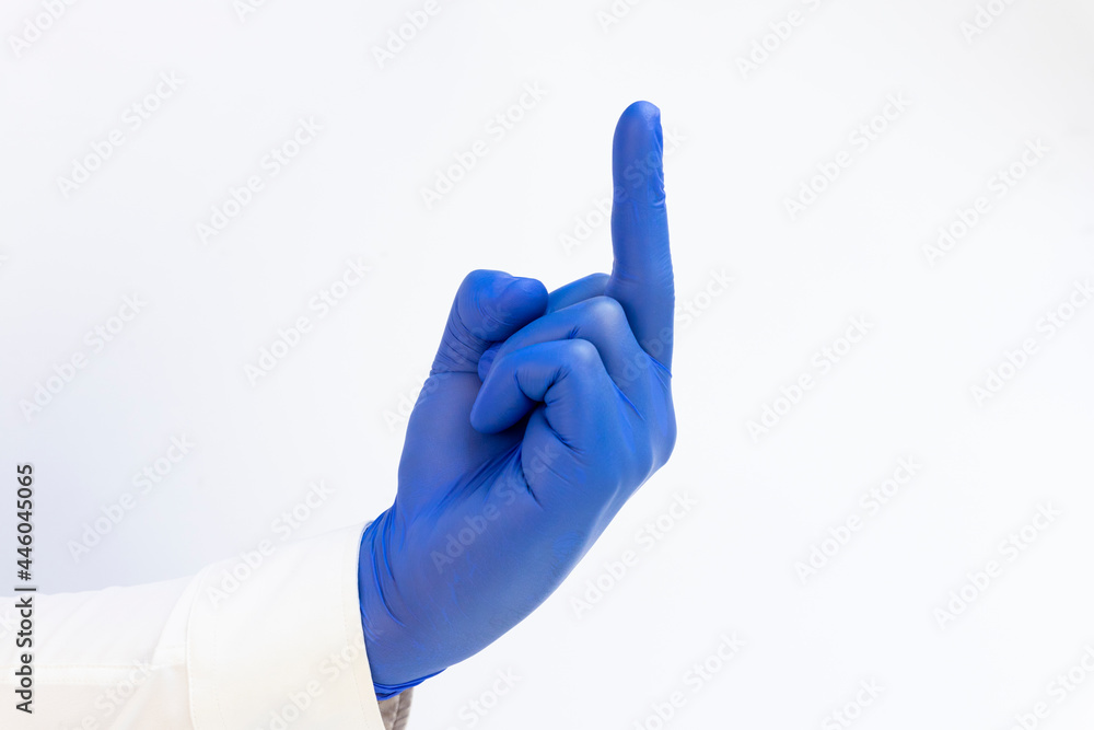 Hand in blue latex Glove giving middle finger. White background. Copy space Hand in blue latex Glove giving middle finger. White background. Copy space