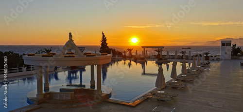 Beautiful sunset over the empty pool and the sea. The Aegean sea. Turkey, Kusadasi. © Irina Anashkevich