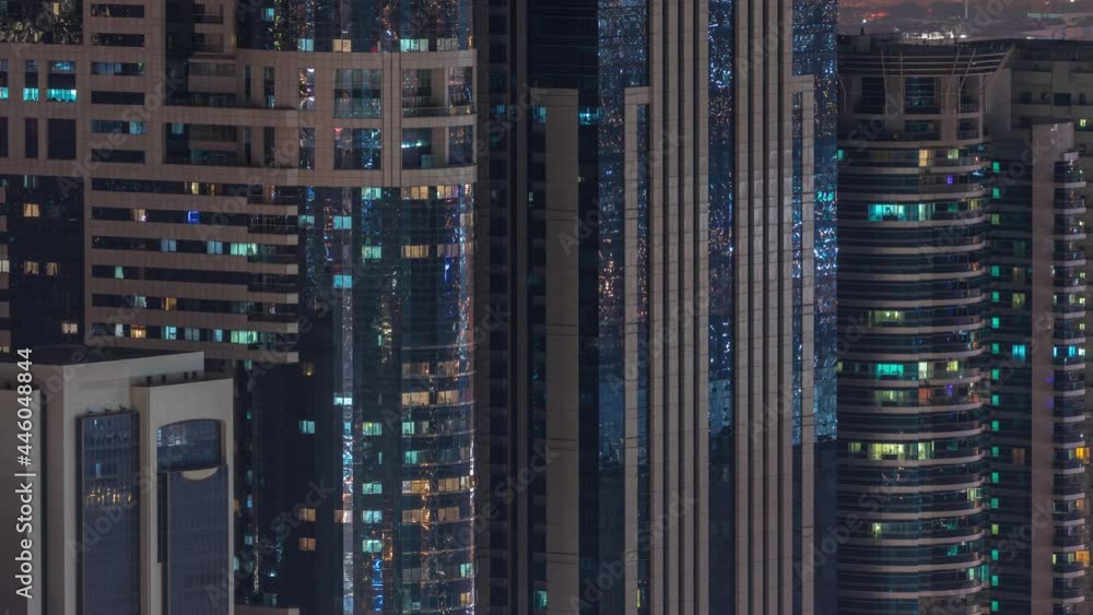 Windows in high-rise building exterior in the late evening with interior lights on timelapse Windows in high-rise building exterior in the late evening with interior lights on timelapse