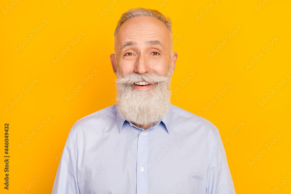 Photo of funny cool age gentleman wear blue shirt smiling isolated yellow color background - obrazy, fototapety, plakaty 
