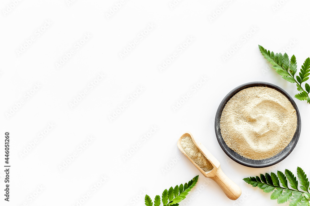 Cosmetic clay powder and mask in bowls, top view Cosmetic clay powder and mask in bowls, top view