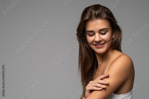Portrait of woman with perfect skin beautiful smile and natural make up