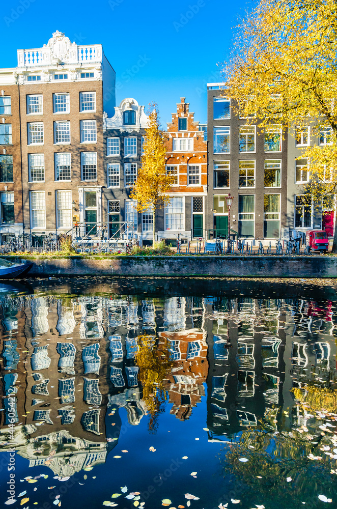 Colorful houses along the canal in Amsterdam, the Netherlands