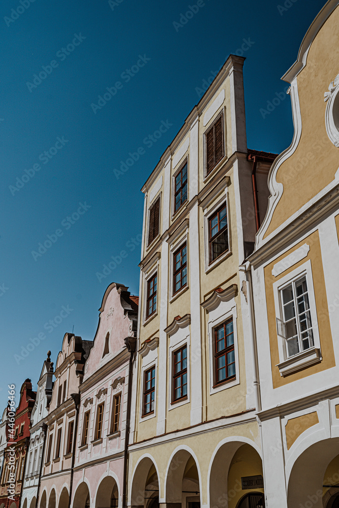 Pastel colors of historic houses at the market square of Telc, Czech