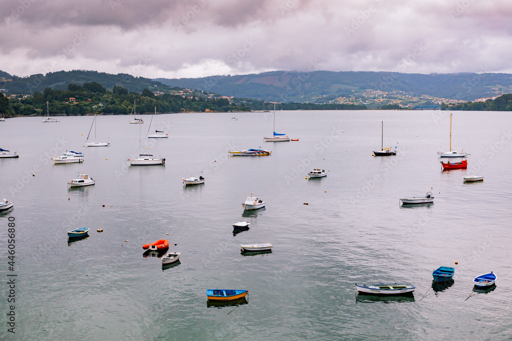 Fototapeta premium Panoramic view with sailor boats near a small village