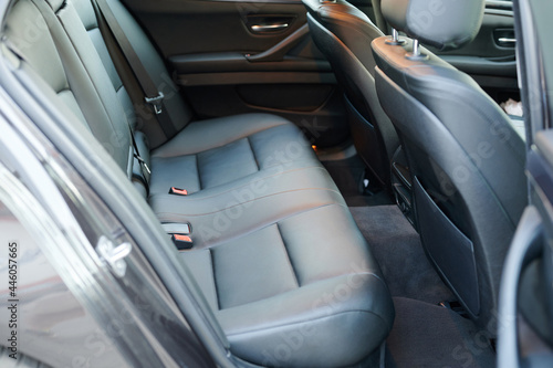 Black leather new car back seat © PixieMe
