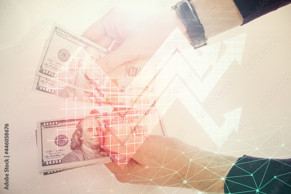 Multi exposure of arrows drawing hologram and USA dollars bills and man hands. Growth concept. Multi exposure of arrows drawing hologram and USA dollars bills and man hands. Growth concept.