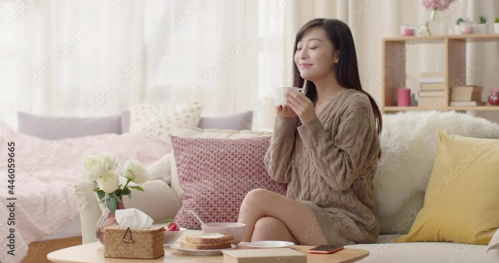 Young Chinese woman drinking coffee at home,4K Young Chinese woman drinking coffee at home,4K