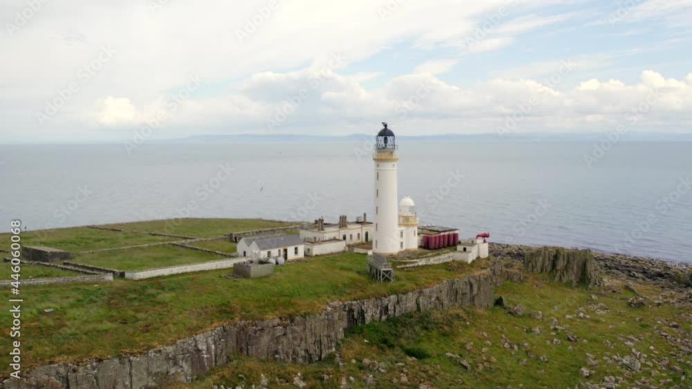 The Island of Pladda off the South Coast of Arran in Scotland with a Lighthouse The Island of Pladda off the South Coast of Arran in Scotland with a Lighthouse