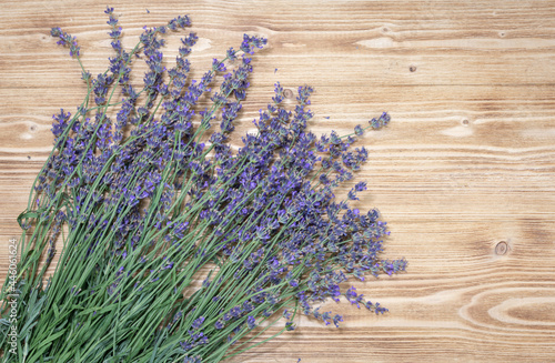 A bouquet of lavender on a light wooden background