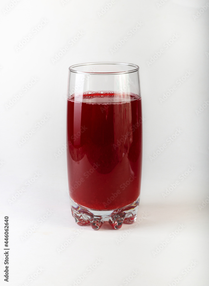 Compote of fresh cherries in a glass cup. Drinks to take away. Cherry compote on a white background. Compote of fresh cherries in a glass cup. Drinks to take away. Cherry compote on a white background.
