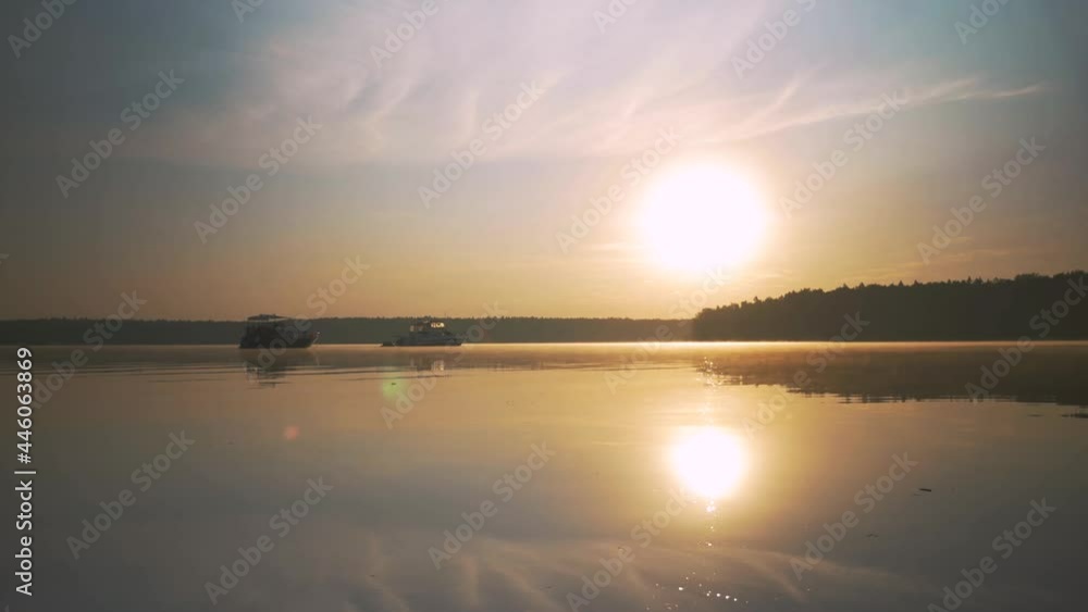 Sunrise on the lake on a quiet summer morning Sunrise on the lake on a quiet summer morning