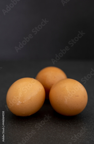 Group of uncooked brown eggs