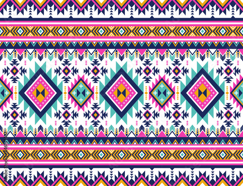 retro color ethnic Navajo seamless pattern. Tribal traditional background design for fabric,carpet,wallpaper,clothing,wrapping,batik. Indian, Scandinavian,Mexican, folk striped pattern in Aztec style.