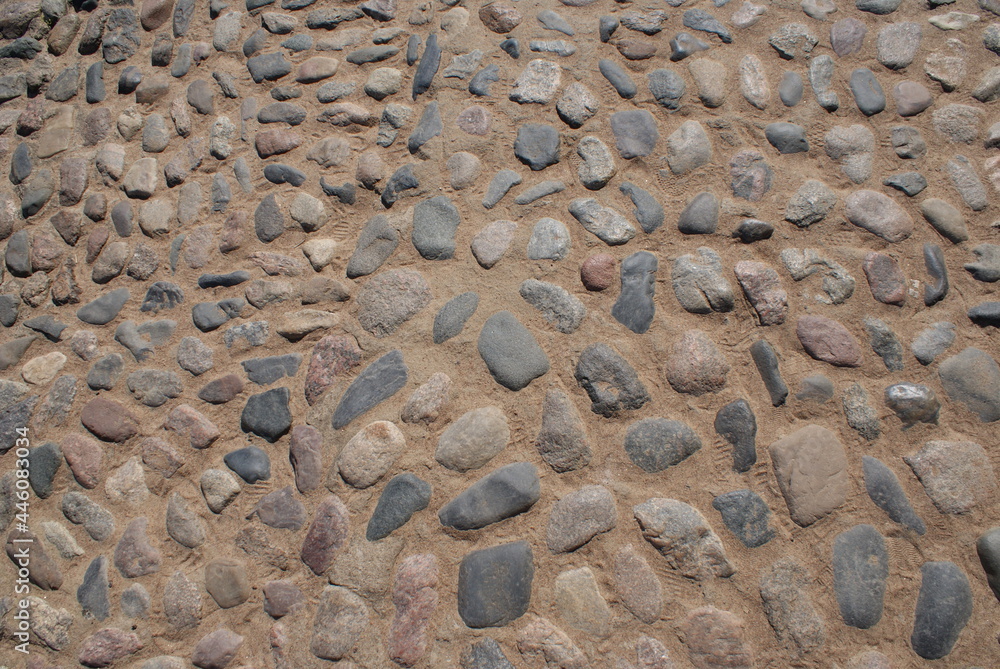 Stone wall, small stones, stone texture, background. Stone wall, small stones, stone texture, background.