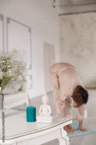 picture of a young beautiful skinny woman doing yoga