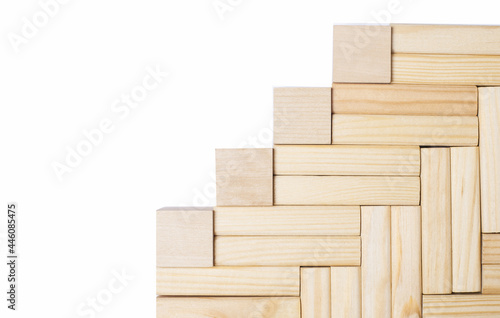 On a light background  a ladder made of wooden blocks and empty cubes with a place to insert text. Template