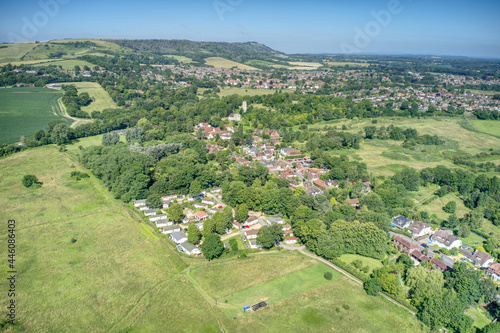 Bramber village and the village centre and Bramber Castle behind St Nicholas Church in the countryside of West Sussex, aerial photo.