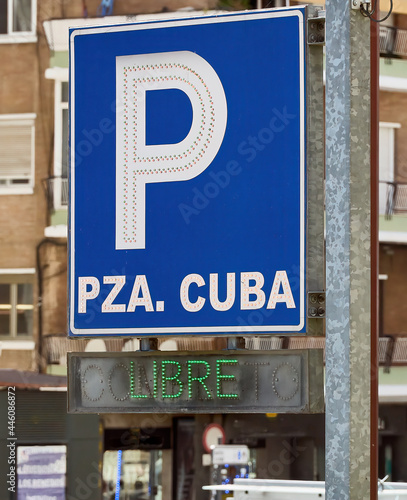 Parking sign with the legend 'P pza. Cuba Libre' (free Cuba) creating an example of amphibology. photo