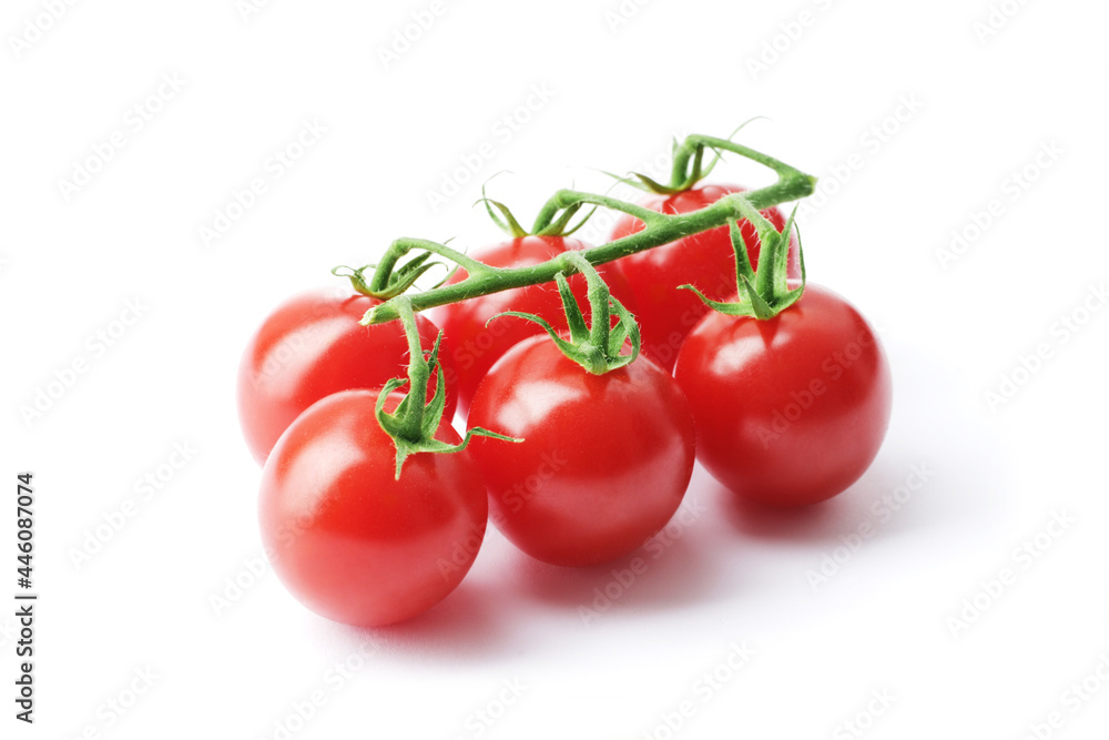 Composition of fresh ripe cherry tomato branches isolated on white background Composition of fresh ripe cherry tomato branches isolated on white background