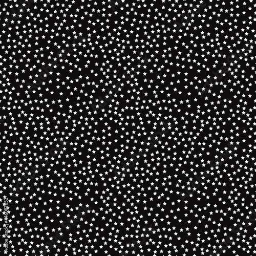 Micro stars pattern. Repeated and seamless white stars and black background. Vector.