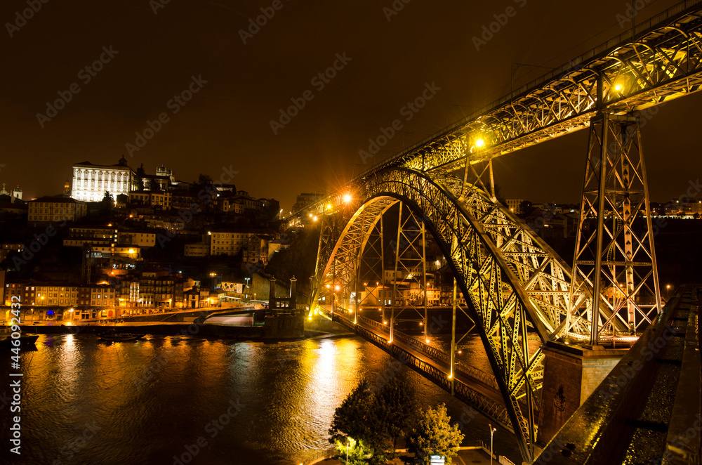 Eiffel bridge in Porto city with night illumination