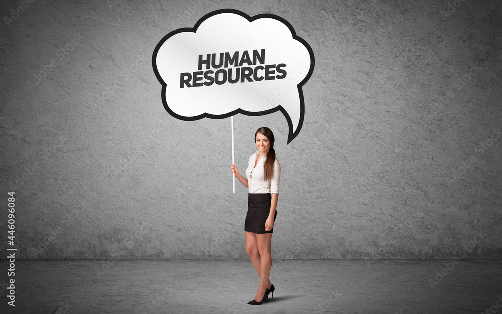 business person in casual holding road sign business person in casual holding road sign