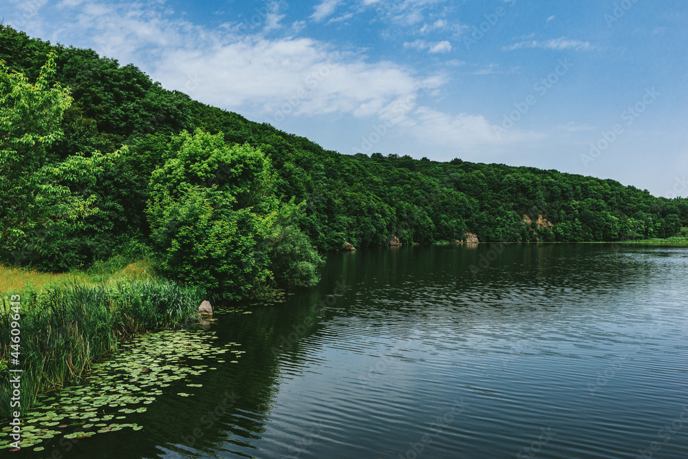 Beautiful summer landscape with river and green forest. Beautiful summer landscape with river and green forest.