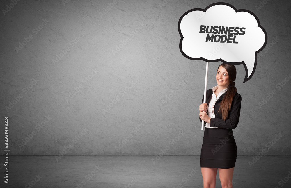 business person in casual holding road sign business person in casual holding road sign
