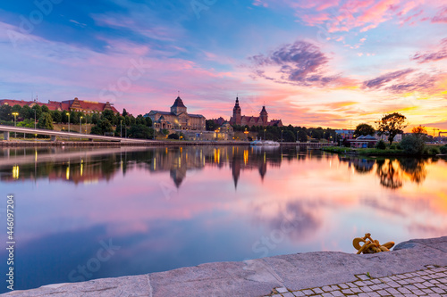 Panorama of National Museum and Voivodeship Office with reflection in river Oder at sunset, Szczecin, Poland
